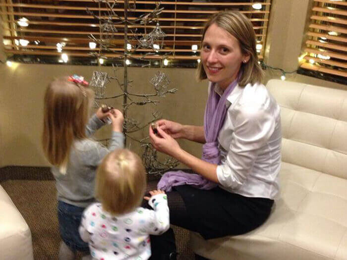 Dr. Malinda Kearbey helping decorate tree