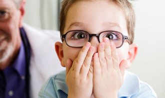 Shocked boy who should visit his Hillsboro emergency pediatric dentist 
