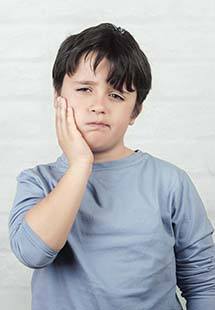 boy with tooth pain