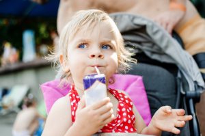 Child drinking from juice box