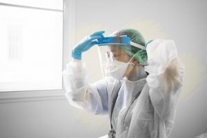 pediatric dentist in Hillsboro wearing extensive PPE