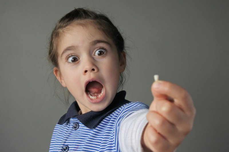 Child with lost tooth