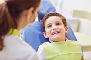 young boy smiling at his special needs dentist in Hillsboro 