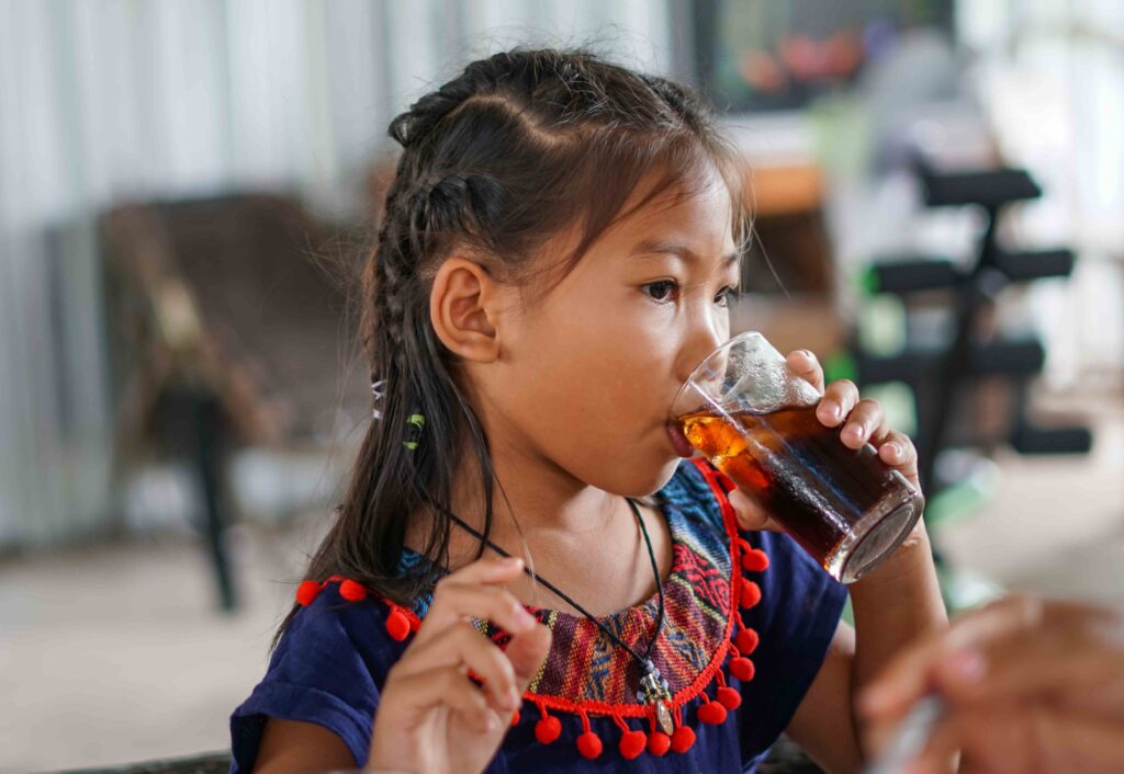 Child drinking soda